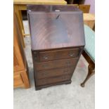 A REPRODUCTION MAHOGANY BUREAU, 20 INCHES WIDE