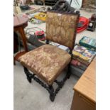 A VICTORIAN CARVED OAK CHAIR ON BARLEY TWIST SUPPORTS