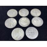 EIGHT WHITE MEDALLIONS