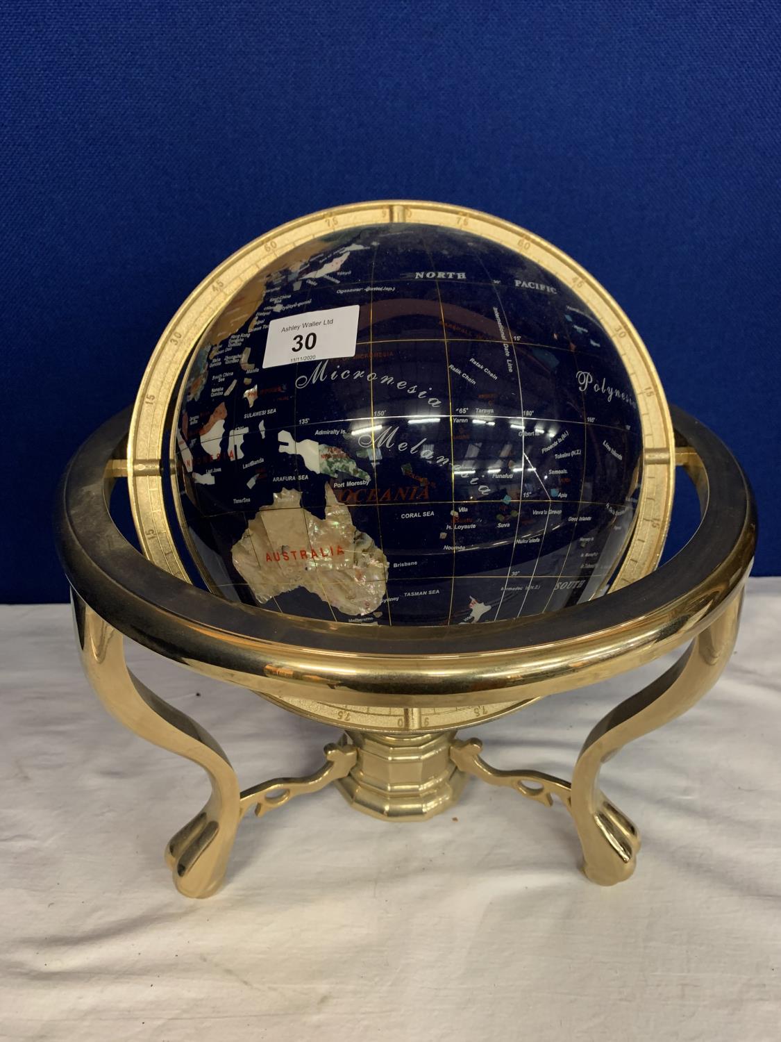 A SPLENDOUR ELEGANCE GEM STONE GLOBE FEATURING OVER TWENTY HIGHLY POLISHED SEMI-PRECIOUS STONES