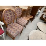 A PAIR OF PINE KITCHEN CHAIRS AND A PAIR OF DINING CHAIRS WITH OVAL BACKS