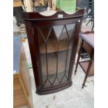 A MAHOGANY CORNER CABINET WITH GLAZED PANEL DOOR