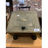 A VINTAGE A BRASS COAL BUCKET WITH DECORATIVE FRONT