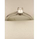 A PLATINUM EMERALD CUT DIAMOND SOLITAIRE RING 0.43 CARAT CLARITY: VS1 COLOUR: K SIZE: O