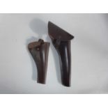 TWO LEATHER GUN HOLSTERS
