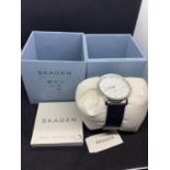 A BOXED SKAGEN SUB DIAL WRIST WATCH IN WORKING ORDER