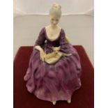 A ROYAL DOULTON FIGURINE CHARLOTTE