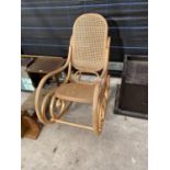 A MODERN BENTWOOD ROCKER WITH SPLIT CANE SEAT AND BACK