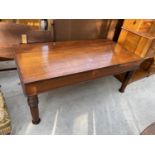 A 19TH CENTURY MAHOGANY LOW TABLE ON TURNED LEGS, 51x26"