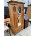 A VICTORIAN SATINWOOD MIRROR-DOOR WARDROBE