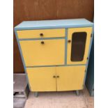 A 1950'S RETRO BLUE AND YELLOW KITCHEN STORAGE CUPBOARD INCORPORATING CUTLERY DRAWER, SHELVES ETC.