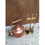A COPPER KETTLE AND A BRASS COMPANION SET