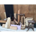 A LARGE QUANTITY OF WOOD TO INCLUDE TABLE PARTS, DRAWERS, BOXES, TABLE LEGS ETC.