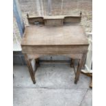 A VICTORIAN MAHOGANY CLERKS DESK WITH FALL FRONT AND SMALL SINGLE DRAWER