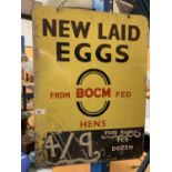A 'NEW LAID EGGS FROM BOCM FED HENS' DOUBLE SIDED METAL SIGN