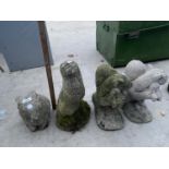 FOUR CONCRETE GARDEN ORNAMENTS - A RABBIT, AN OTTER AND TWO SQUIRRELS