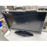 A 31" SHARP TELEVISION WITH REMOTE CONTROL BELIEVED IN WORKING ORDER BUT NO WARRANTY