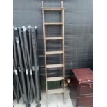 A SET OF VINTAGE WOODEN STEPLADDERS