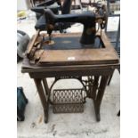 A VINTAGE SINGER SEWING MACHINE MODEL Y7546734 WITH SINGER BASE