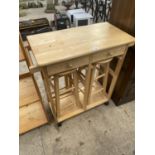 A KITCHEN TABLE AND TWO STOOLS