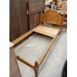 A MODERN PINE SINGLE BEDSTEAD