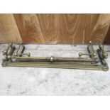 TWO BRASS FIRE FENDERS 132CM AND SMALLER ONE MEASURING 107CM