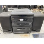 A GOODMANS HI-FI SYSTEM WITH THREE CD DISC CHANGER BELIEVED IN WORKING ORDER BUT NO WARRANTY