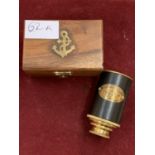 A BOXED BRASS AND LEATHER VICTORIAN MARINE TELESCOPE