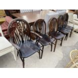 FOUR WHEEL BACK OAK DINING CHAIRS AND A MATCHING CARVER