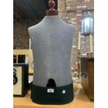 A MALE MANNEQUIN TORSO