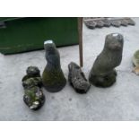 FOUR CONCRETE GARDEN ORNAMENTS - FOUR OTTERS