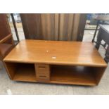 A RETRO TEAK PANDORAS BOX STYLE COFFEE TABLE ENCLOSING TWO DRAWERS, 48x23"