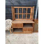 A MAHOGANY SHOP COUNTER WITH GLAZED GALLERIED BACK