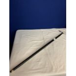 A BLACK WOODEN WALKING STICK WITH CHROME JAGUAR HANDLE