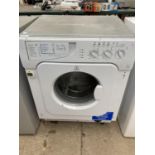 A WHITE INDESIT WASHING MACHINE BELIEVED IN WORKING ORDER BUT NO WARRANTY