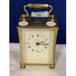 A VINTAGE BRASS CARRIAGE CLOCK WITH VISUAL MOVEMENTS