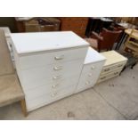 A MODERN WHITE FIVE DRAWER CHEST, A THREE DRAWER SMALLER CHEST AND A FURTHER CHEST OF TWO DRAWERS