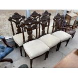 A SET OF SIX HEAVILY CARVED 19TH CENTURY STYLE DINING CHAIRS ON TURNED AND FLUTED LEGS
