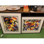 A PAIR OF BLACK FRAMED ABSTRACT PRINTS