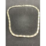 A SILVER NECKLACE