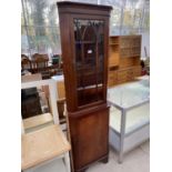 A MODERN MAHOGANY CORNER CUPBOARD