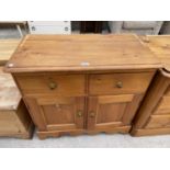 A VICTORIAN STYLE SMALL DRESSER BASE ENCLOSING TWO DRAWERS AND TWO CUPBOARDS, 33" WIDE