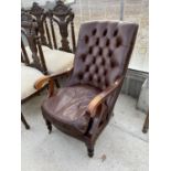 A 19TH CENTURY STYLE BUTTON BACK MAHOGANY FRAMED FIRESIDE CHAIR IN LEATHER, BY MILLBROOK FURNISHINGS