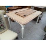 A MODERN OAK AND PAINTED DINING TABLE ON TURNED SUPPORTS