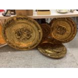 FIVE BRASS PLATTERS TO INCLUDE TWO VERY LARGE EXAMPLES