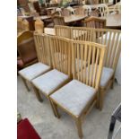 A SET OF SIX MODERN OAK DINING CHAIRS