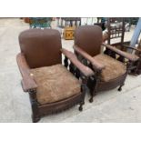TWO OAK AND STUDDED LEATHER ARMCHAIRS