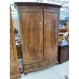 A 19TH CENTURY STYLE MAHOGANY TWO DOOR BOWFRONTED WARDROBE WITH DRAWER TO THE BASE,S 54" WIDE