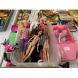 AN ASSORTMENT OF BARBIE DOLLS TO INCLUDE A BARBIE CAR AND SCOOTER