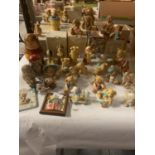 AN ASSORTMENT OF CHERISHED TEDDIES FIGURES AND RUSSIAN DOLLS